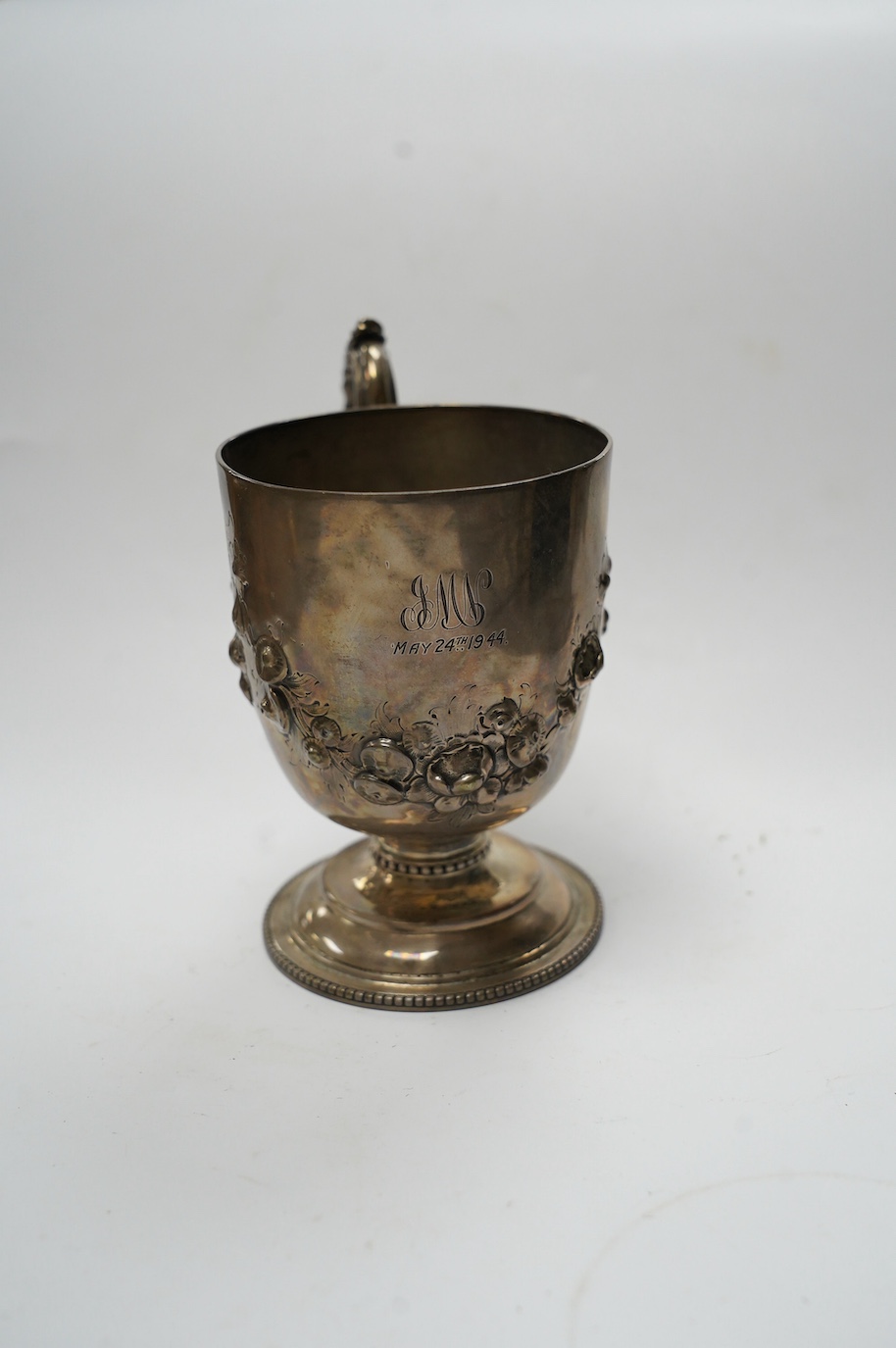 A Victorian silver pedestal christening cup, by Joseph Angell II, London, 1856, 11.5cm, 6.4oz, with later engraved inscription. Condition - fair